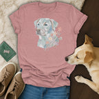 Pink t-shirt with a mosaic dog portrait and flowers, styled with jeans and sneakers.