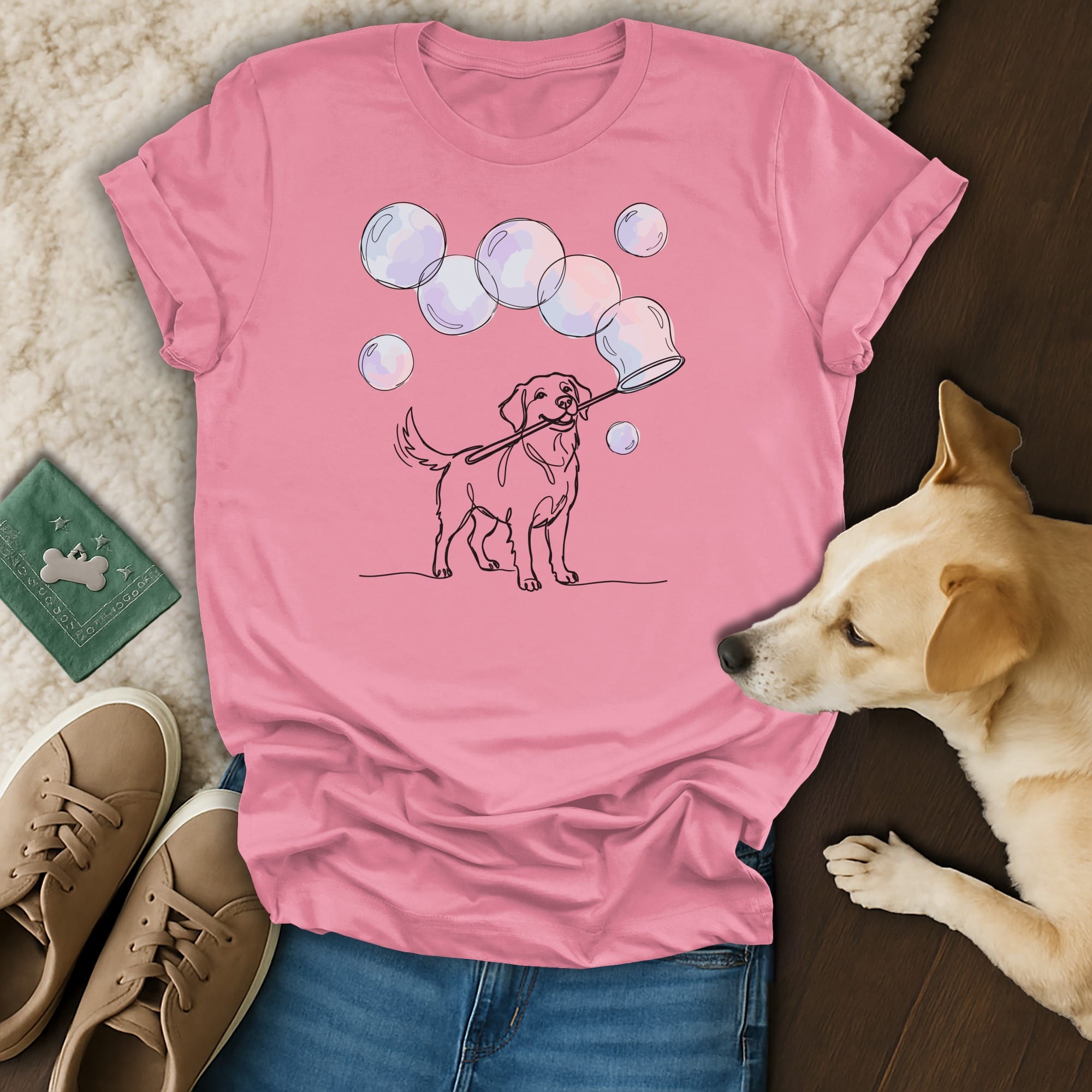 Line drawing of a dog blowing bubbles on a pink t-shirt.