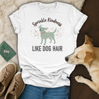 White t-shirt with a dog graphic and text "Sprinkle Kindness LIKE DOG HAIR".