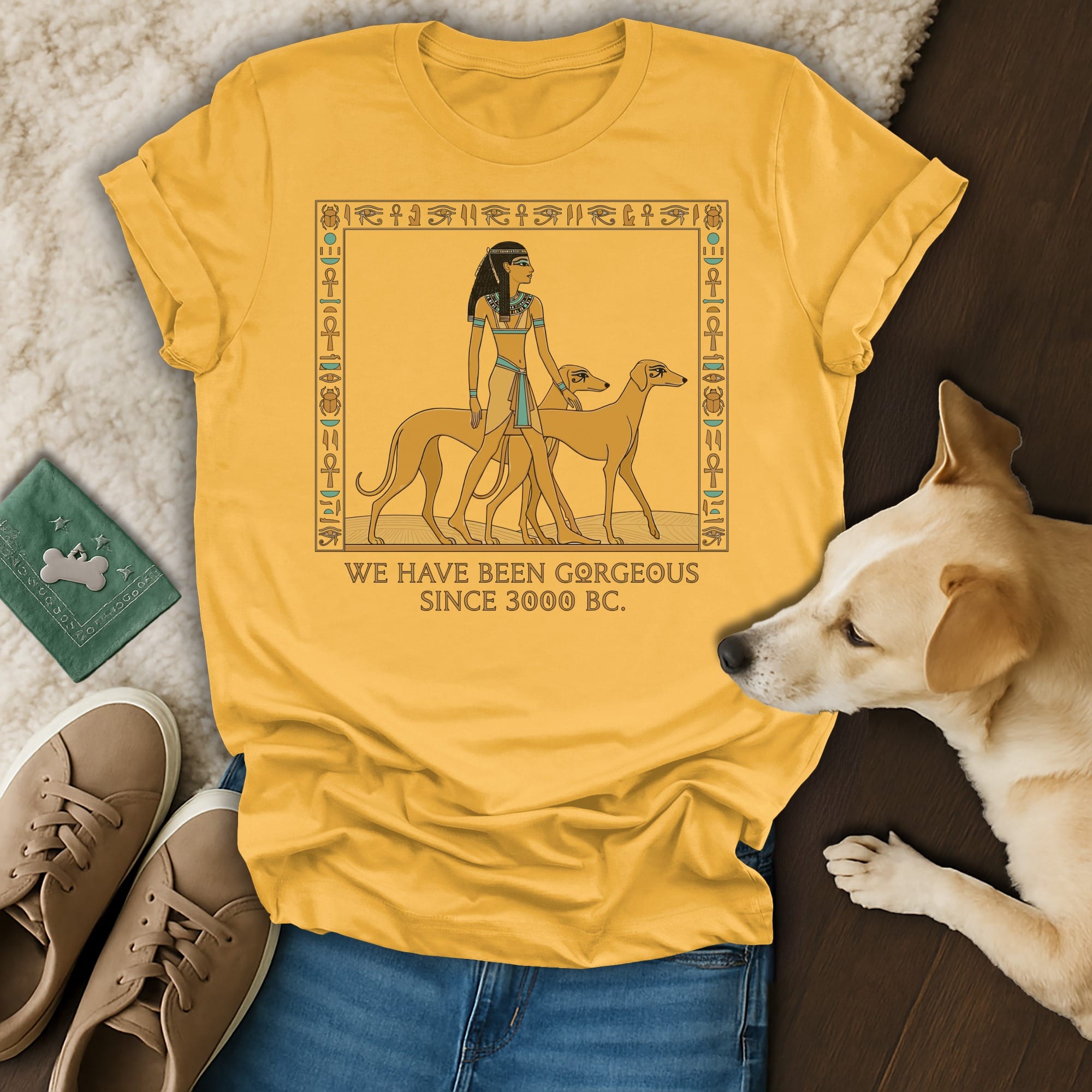 Yellow t-shirt with Egyptian-themed graphic and "We Have Been Gorgeous Since 3000 BC."