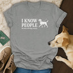 Grey v-neck t-shirt with "I KNOW PEOPLE the ones with dogs, anyway" text and a dog illustration.