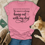 Pink t-shirt with text "The answer is always hung out with my dog."