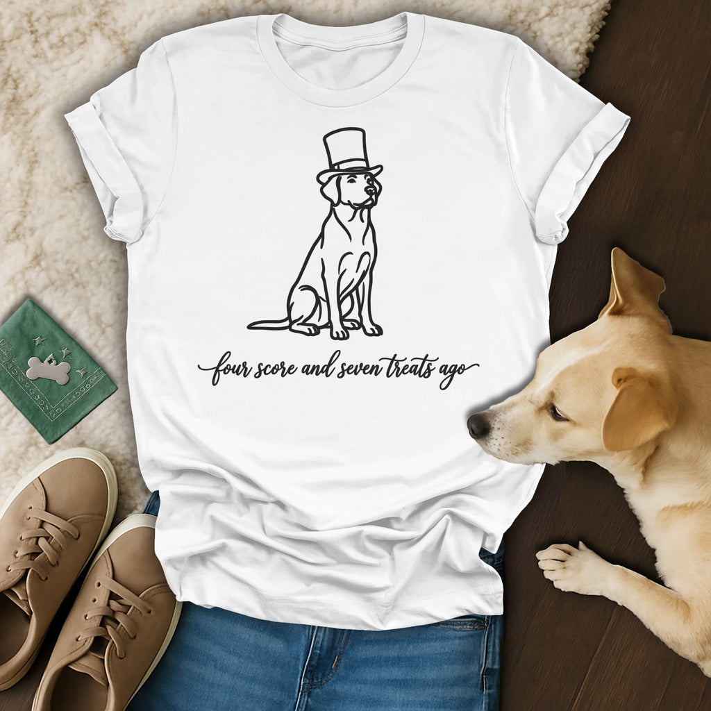 White t-shirt with a line drawing of a dog wearing a top hat and text.