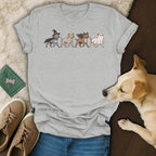 T-shirt with a Halloween-themed parade of four dogs in costumes.