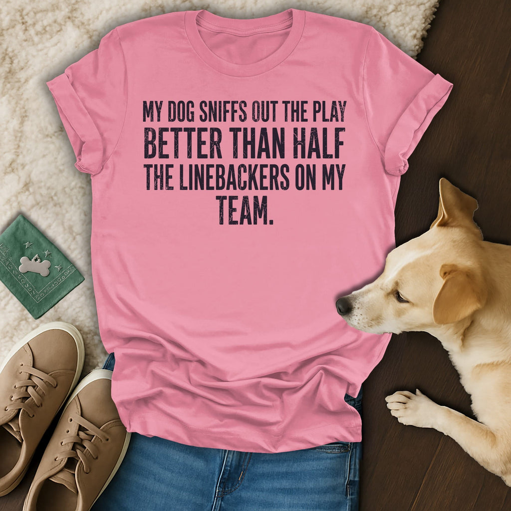 Pink t-shirt with text about dogs and football linebackers.