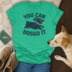 Green t-shirt with "You Can Doggo It" text and a dark blue dog illustration.