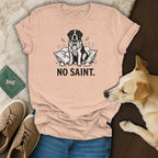 T-shirt with black and white dog graphic and text "NO SAINT."