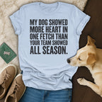 Light blue t-shirt with text about a dog's heart and a team's season.