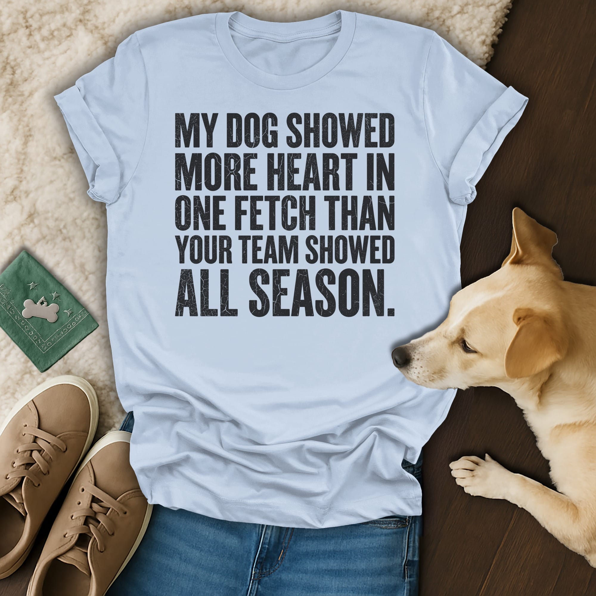 Light blue t-shirt with text about a dog's heart and a team's season.