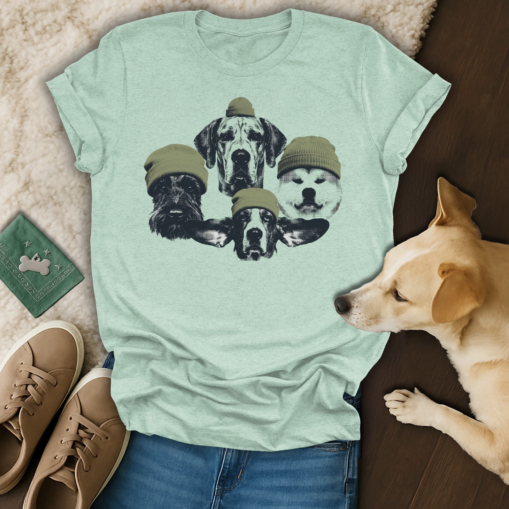 T-shirt with illustrated dog faces wearing beanies.