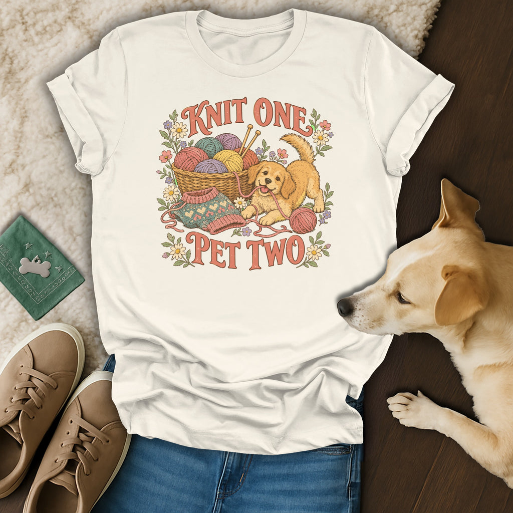 Cream t-shirt featuring a puppy, yarn basket, floral illustration, and the text Knit One Pet Two.