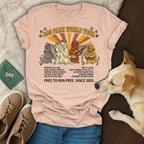 "Dog Park World Tour" t-shirt with dogs and van graphic, featuring text about dog adventures.
