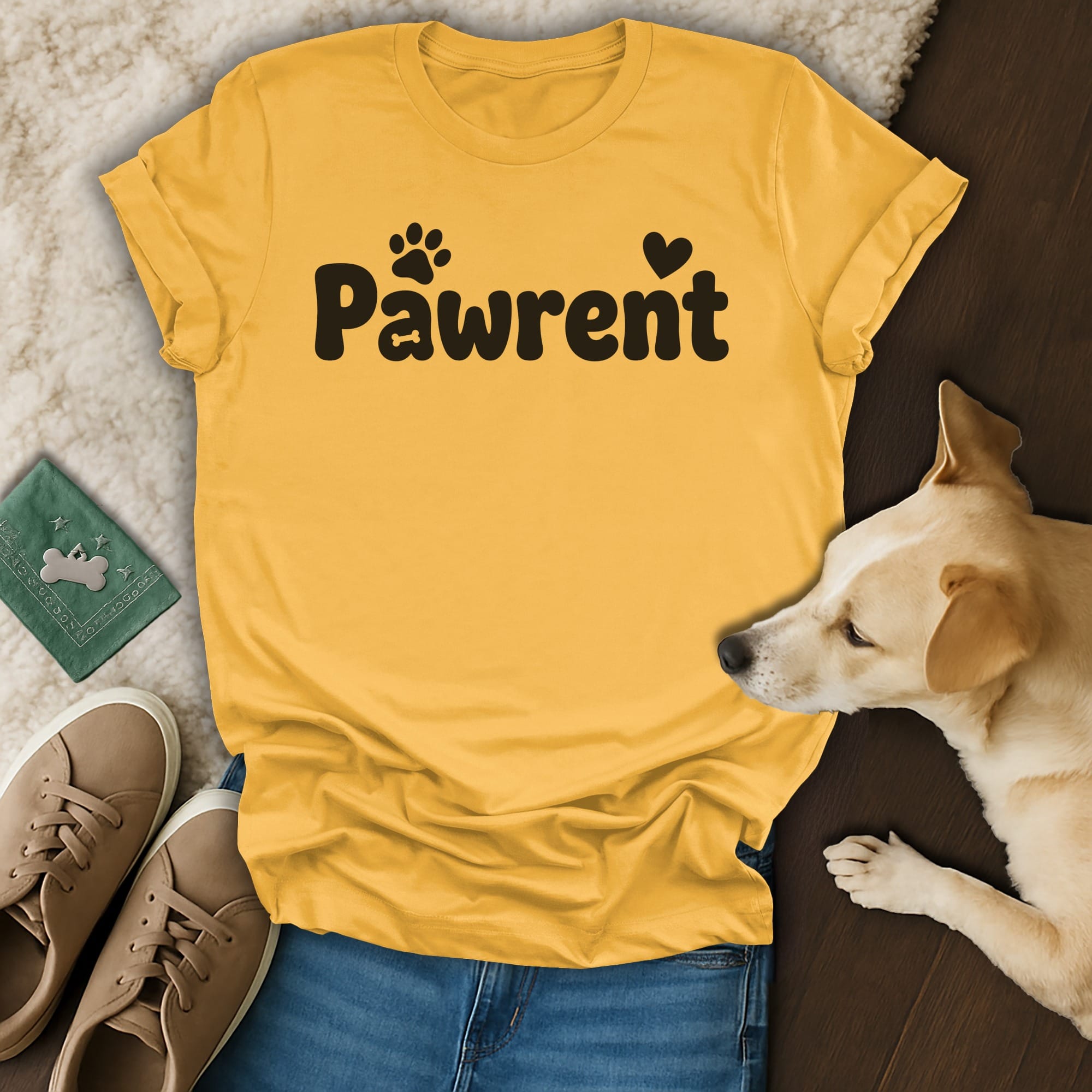 Yellow t-shirt with "Pawrent" text and paw print, dog, shoes, and jeans.