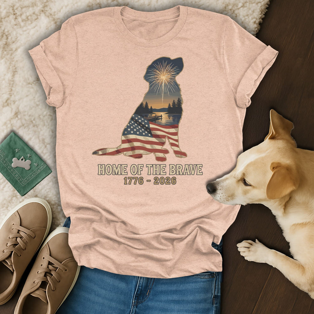 Silhouette of a dog with American flag, fireworks, and lake, text "Home of the Brave 1776 - 2026".
