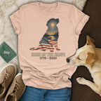 Silhouette of a dog with American flag, fireworks, and lake, text "Home of the Brave 1776 - 2026".