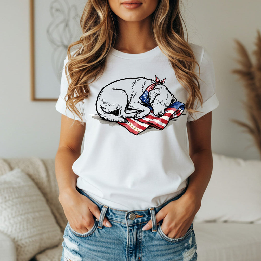 White t-shirt with a sleeping dog on an American flag.