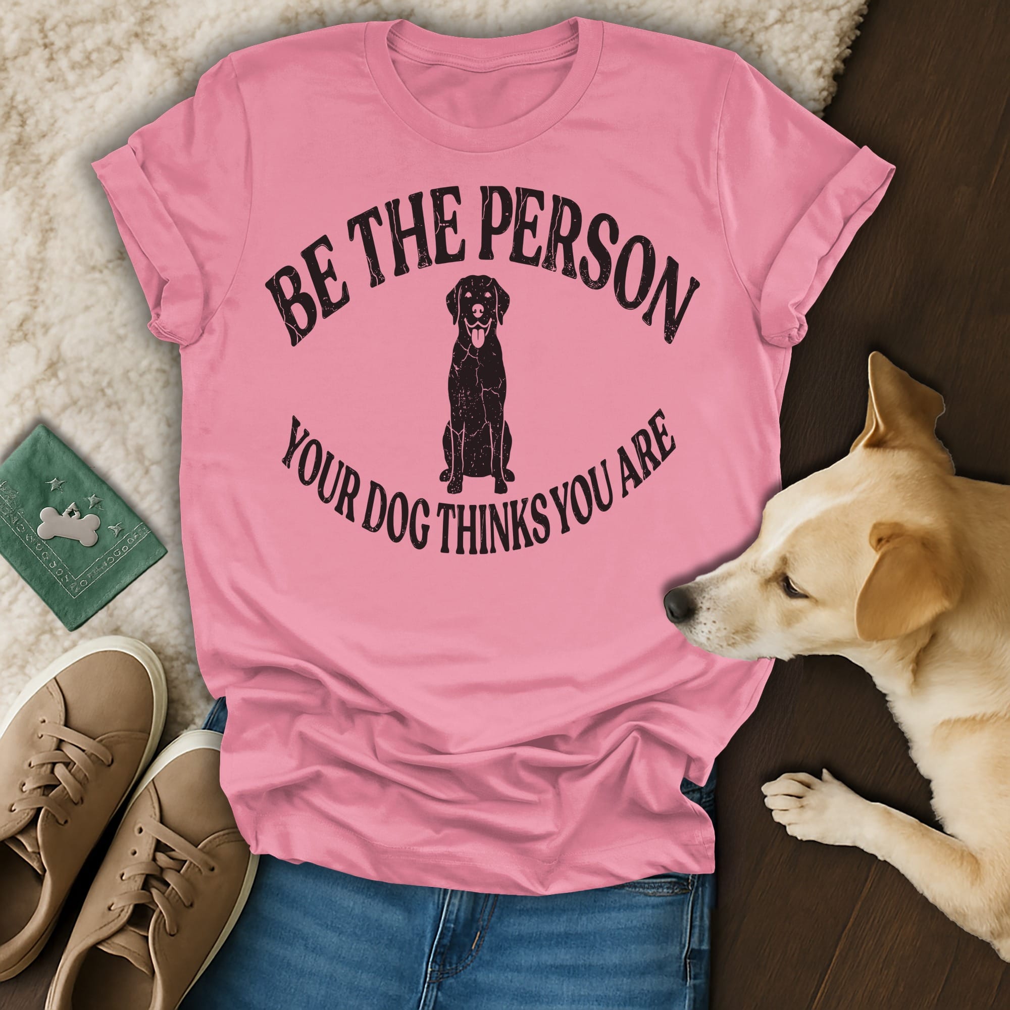 Pink t-shirt with black text and dog graphic: "Be the person your dog thinks you are."