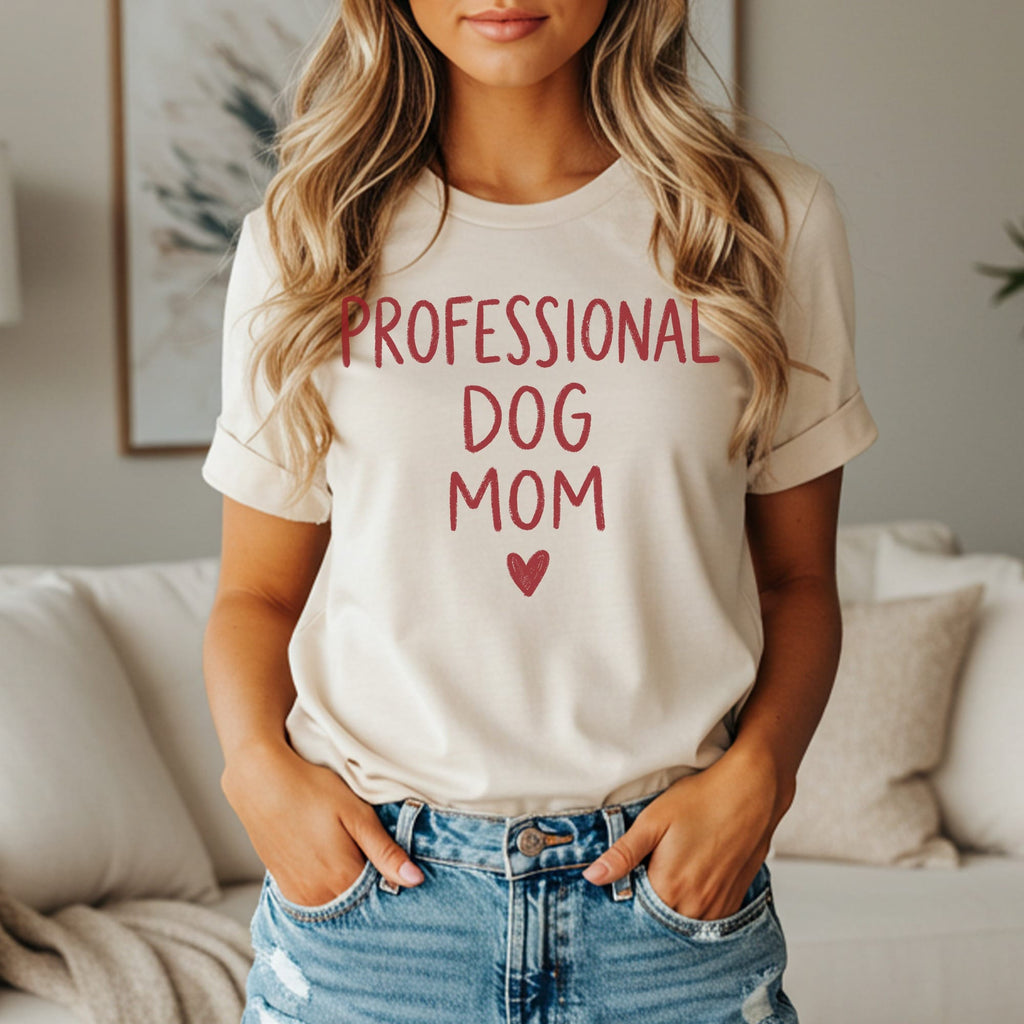 Cream t-shirt with red text "PROFESSIONAL DOG MOM" and a heart.