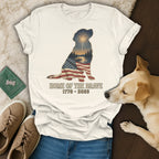 White t-shirt with patriotic dog silhouette and text "Home of the Brave 1776 - 2026".