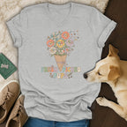 Grey t-shirt with a floral bouquet of puppies and text "FRESH PICKED PUPS".