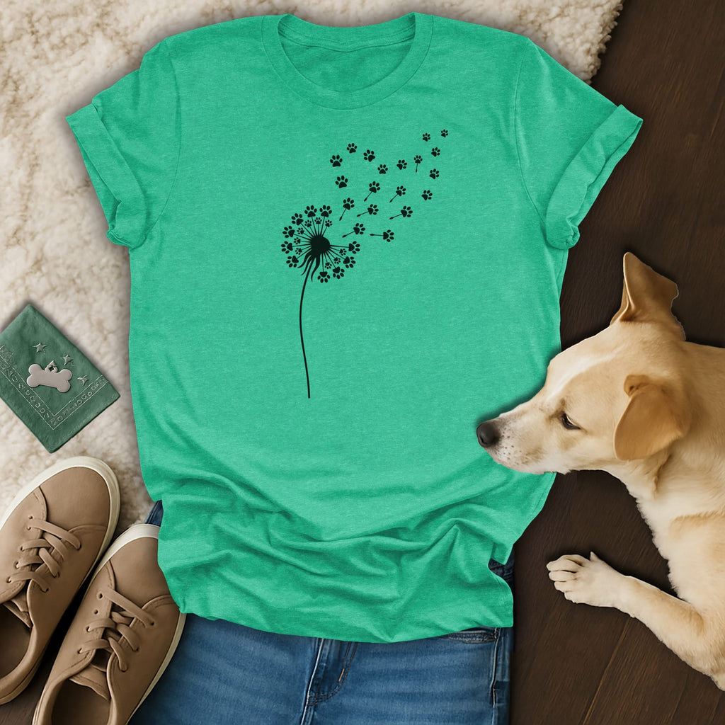 Teal t-shirt with a dandelion design made of paw prints.