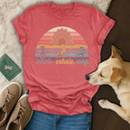 T-shirt with sunset mandala, yoga dogs, and text "Inhale, exhale, wag".