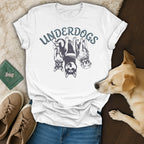 White t-shirt with "UNDERDOGS" text and three dogs wearing sunglasses.