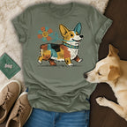 Corgi wearing a collar, walking with a flower on a t-shirt.