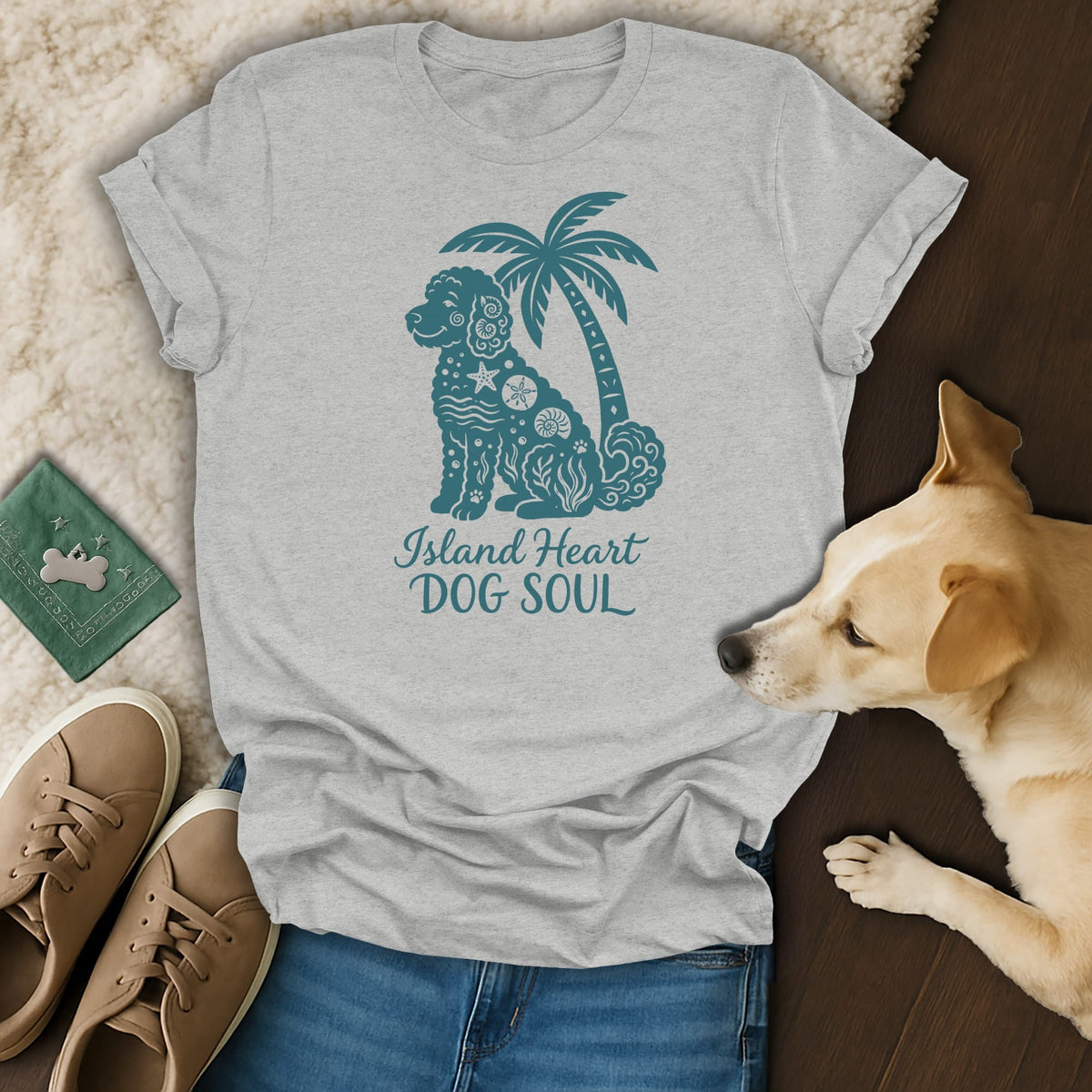 Grey t-shirt with teal design of a dog, palm tree, and text "Island Heart DOG SOUL".