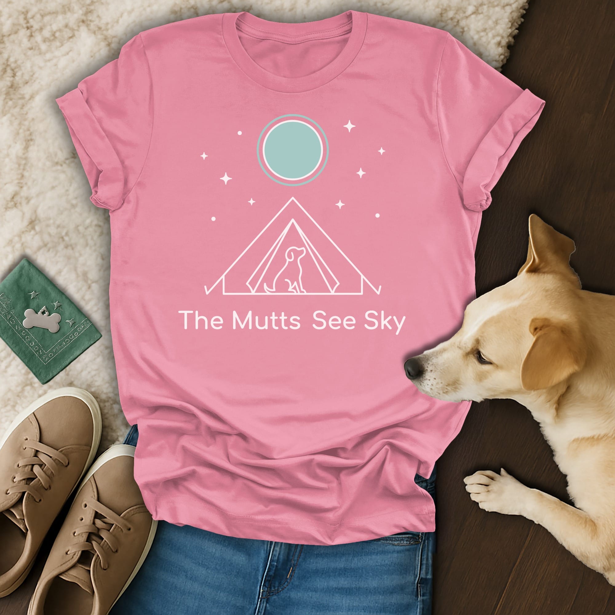 Pink t-shirt with tent, dog, moon, and stars graphic, text "The Mutts See Sky."