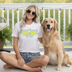 Woman wearing tennis-themed shirt with dog, "40 - Love" text.