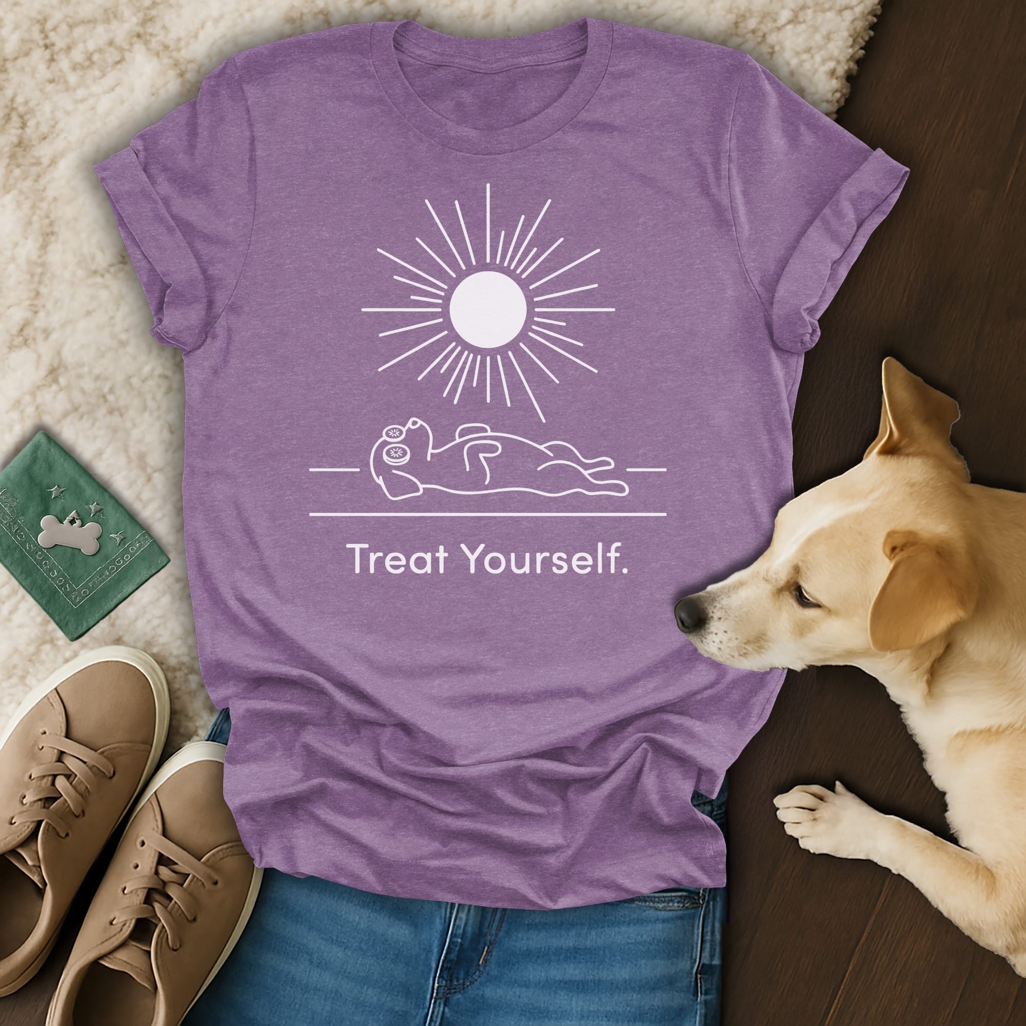 Purple t-shirt with sun and dog design and "Treat Yourself" text.