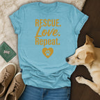 Aqua t-shirt with "Rescue. Love. Repeat." and a paw print heart.
