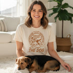 Woman with dog wearing "Fortune Favors the Dog" t-shirt.