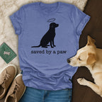 Black dog silhouette with paw prints above its head, on a blue t-shirt.