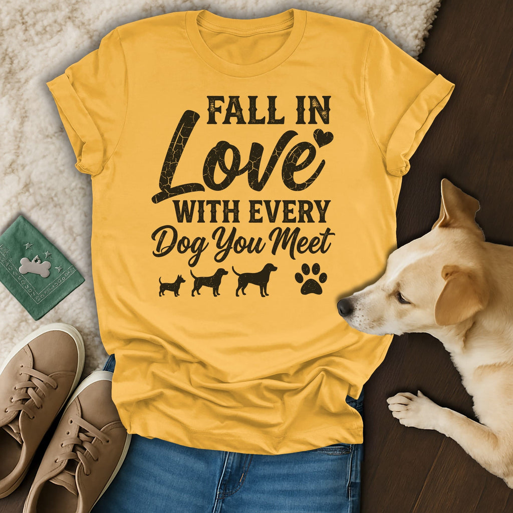 Yellow t-shirt with "Fall in Love with Every Dog You Meet" text and dog silhouettes.